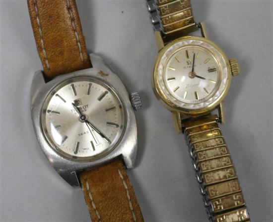 An Omega 18ct gold ladys wristwatch and a Tissot Seastar stainless steel ladys wristwatch